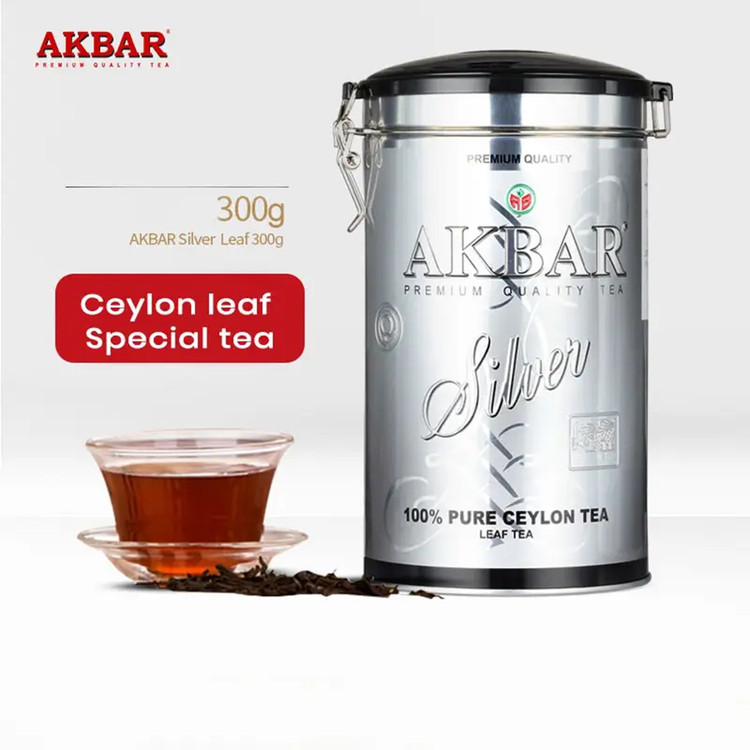 چای سیاه سیلان با طعم ساده اکبر سیلور اصلی وارداتی قوطی فلزی استوانه ای بلند با درب قفل دار (نقره ای رنگ) 300 گرمی
